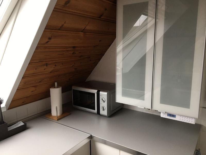 Microwave and cupboard