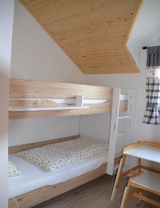 Ferienhaus Sperling Kinderzimmer mit Stockbett