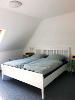 Schlafzimmer mit Doppelbett