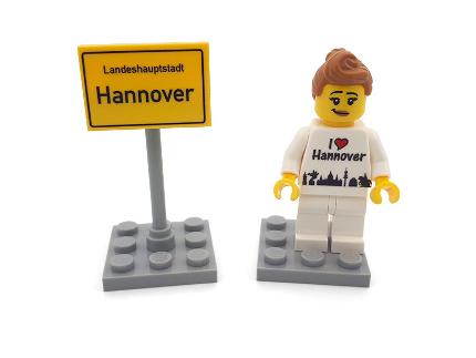 Hanover figure with city sign